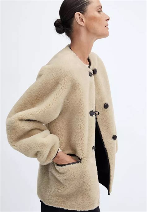 mango appliques faux fur coat.